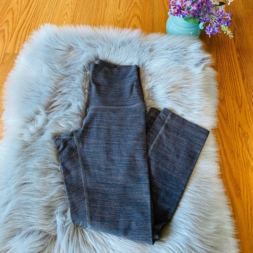 Lululemon wunder under high rise cropped leggings.